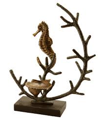 Spice up your plain candle holders with this awesome idea to create a cutout of a seahorse on a this diy kit comes with a mason jar, sea glass, sand, seashells, glue, a candle, and a small bead to. Seahorse Candle Holder