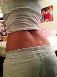 Microdermal Lower Back Piercing Dimple Piercing Back Dimple Piercings Dermal Piercing
