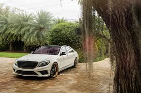 White Car Black And Bronze Wheels Extremely Stylish White Mercedes S Class With Black Roof And Bronze Wheel Lip Mercedes S Class Bronze Wheels S Class