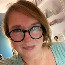 Profili për C Jean Grover