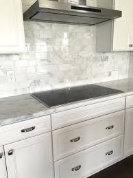 Carrera Marble Subway Tile Backsplash With White Cabinets Kitchen Ideas Kitchen Marble Kitchen Remodel Kitchen Backsplash