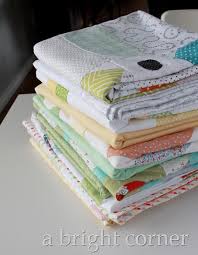 Image result for pile of quilt tops
