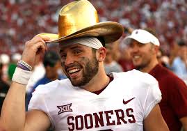 Baker Mayfield Galloped Off The Field While Wearing The Golden Hat — spencer sanders threw for 305 yards and four touchdowns, and oklahoma state held off no.