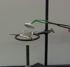 An adjustable rod connects to a sturdy base (often made of cast steel) to support a clamp. Crucible Heating Apparatus Chemistry Stack Exchange