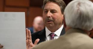 County appoints Sheriff Hughes, rejects hand-marked ballot study
