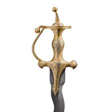 A Sikh steel-hilted sword (talwar) with ...