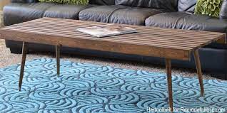The brushed matte, slatted table top and contrasting edge finish bring a slightly modern flair that appeals to every taste. Remodelaholic Diy Modern Slat Coffee Table Building Plan