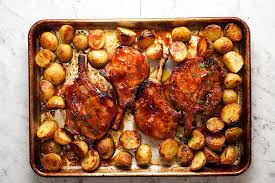 Dip pork chops in egg mixture, coat with stuffing mix and place in pan. Oven Baked Pork Chops With Potatoes Recipetin Eats