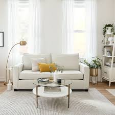 You'll find endless uses for its slim design that slides under the sofa and also opens up to 24 wide. Henry Sofa