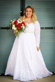 Plus Size Lace Corset Wedding Gown With Long Sleeves On A Real Bride Rinat Studio Levana Wedding Dresses Plus Size Plus Size Wedding New Wedding Dresses