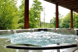 Meadow cabin's hot tub view from the back. Cabins With Hot Tubs In Maine Glamping Hub