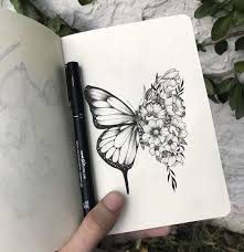Fabulous butterflies with flowers tattoo on back shoulder. Butterfly Flower Hybrid Tattoo Idea On We Heart It