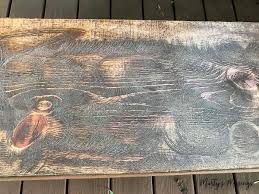 Apply the white wash to the wood in long strokes with a paint brush. How To Build Industrial Pipe Shelves And Make New Wood Look Old