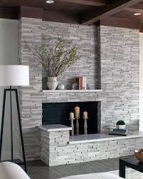 This surround re novation by the duo behind chris loves julia incorporates the latter. Modern Stone Fireplace Designs