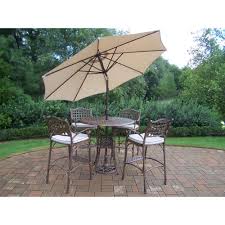 Oakland Living Elite Cast Aluminum 7 Piece Round Patio Bar Height Dining Set With Oatmeal Cushions And Umbrella Patio Bar Set Patio Outdoor Dining Set