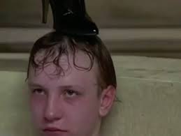 Lady Sylvia Marsh playing with her food in ‘Lair of the White Worm’  directed by Ken Russel, 1988