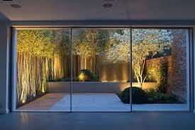 Bamboo White Flowers And A Water Feature Turn This Small Garden Into A Showstopper Design John Davie Modern Garden Lighting Modern Landscaping Modern Garden