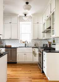 Dark floors are super popular in kitchens (in fact, the most popular stain color) because they contrast so well with white cabinets (the most popular cabinet color). Projects Lu Design Build