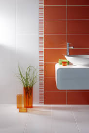Brighton Orange 24 8x39 8cm Gloss Wall Tile By British Ceramic Tiles Uk Orange Bathrooms Tile Bathroom Bold Bathroom Tile