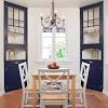A dining room corner hutch is often used to store and display china in the top cabinet area and serving bowls in the bottom cabinet. 1
