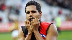 Former Essendon AFL star Andrew Lovett charged with assault