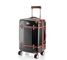 Use a pen or a sharp object to push in the button until you hear a click. Mark Graham Terminal 1 Carry On Pottery Barn