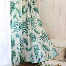 Banana leaf palm tree tropical curtains chic kelly green pint drapes the staging in this room is good with the use of the leaf covered curtains and light brown furniture inorder to give the room an. Tropical Jungle Palm Tree Green Leaf Curtain Voila Voile