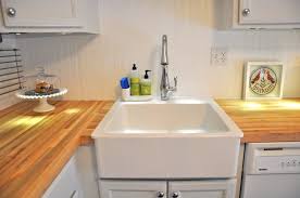 porcelain apron sink near corner