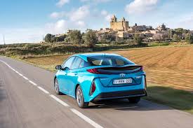 The toyota prius prime is an affordable hybrid vehicle. Solar Roof Helps Toyota Double The Range Of 2017 Electric Prius Plug In Gallery Video Car Model News