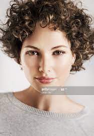 Beauty Portrait Of Curly Brunette Woman Short Layered Curly Hair Short Curly Hairstyles For Women Short Silver Hair