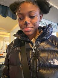 Volunteers for harvest festival face painting