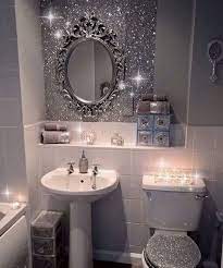 This tiny bathroom is made to feel much larger by the inclusion of mirror all around the room. Pin On All That Glitters