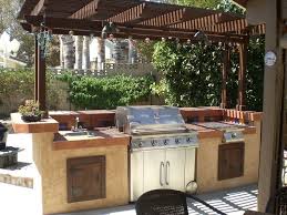 Large elegant backyard concrete paver patio kitchen photo in richmond with a pergola not sure if this will fit in our yard, but like the dedicated eating/cooking space. Kitchen Ideas Outdoor Kitchen Pergola Ideas