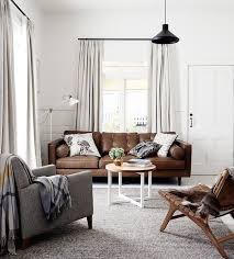 Don't miss these decorating ideas to help your leather couches look amazing! Clean White Walls Chic Ways To Style A Brown Sofa In Your Living Room Living Room Grey Brown Living Room Brown Living Room Decor
