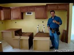 How To Install Base Cabinets Part 1 Of 4 Wmv Installing Kitchen Cabinets Kitchen Base Cabinets Base Cabinets
