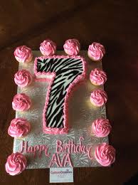7th Birthday Cake For 7 Year Old Boy Images Chocolate Number 7 Cake With Zebra Print Fondant Pipes With Hot Pink Icing Vanilla Cupcakes Topped Wit 7th Birthday Cakes Zebra Birthday Cakes Zebra Birthday