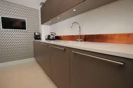 Particle board, melamine interior cabinetry drawer construction: 25 Trendy Metal Kitchen Backsplashes To Try Digsdigs