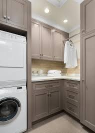 Gray Laundry Room Features Gray Shaker Cabinets Painted Benjamin Moore River Reflections Pa With Images Grey Laundry Rooms Laundry Room Design Laundry Room Storage Shelves