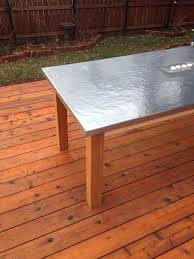 Great looking zinc top on painted base. How To Make A Diy Outdoor Zinc Table Diy Outdoor Table Zinc Table Outdoor Table Tops
