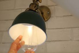 They provided a bit of architectural detail, contrast, and could be functional to add a glow to this room which needed a cozy. Diy Sconces To Have Light Without Power Magic Light Trick Nesting With Grace