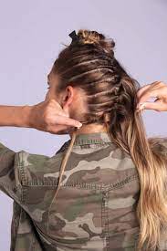 The mohawk takes its name from the warriors of a native american tribe and has been worn by mohawks are characterized by having both sides of the head shaved and leaving a strip of noticeably longer hair down the middle. Faux Hawk Women Easy Tutorial 5 Looks To Try In 2021
