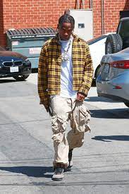 Jacques bermon webster ii, (born april 30, 1991) known professionally as travis scott (formerly stylized as travi$ scott), is an american rapper, singer, songwriter, and record producer. Travis Scott Is The Latest Person To Ride The Baggy Cargo Pants Wave