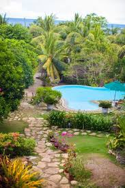 Keeping your yard healthy is the easiest way to maintain your landscape design. Tropical Pool Designs Creating A Paradise In Your Backyard Pool Pricer