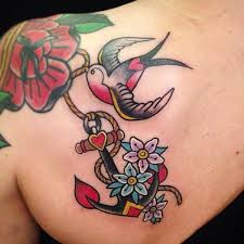 Feb 11, 2019 · remember, the first set of flowers form on old wood. Flying Bird With Colorful Flowers And Anchor Tattoo