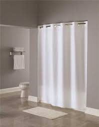 Discover a unique and stylish collection of shower and bathroom curtains at urban outfitters. Hookless 71 Inch X 74 Inch White Plain Weave Polyester Shower Curtain