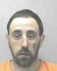 Brandon Hartman charged with stealing items from police station