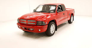 Image result for Dark Garnet Red 2002 Dakota