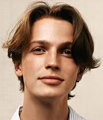 The eboy haircut, also referred to as a curtain hairstyle, involves hair that is longer in length, usually falling around the ear. The Curtain Haircut Interesting Ways To Wear Curtains In 2021 Curly Hair Men Middle Part Hairstyles 90s Hair Men
