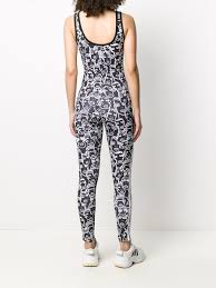 Sneakers, track jackets, biker shorts and more. Fiorucci X Adidas Faces Print Jumpsuit Farfetch