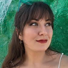 Alice in wonderland is my favourite Disney film I think it's cos everyone  is a little crazy in it I can relate so I did a Alice page xx